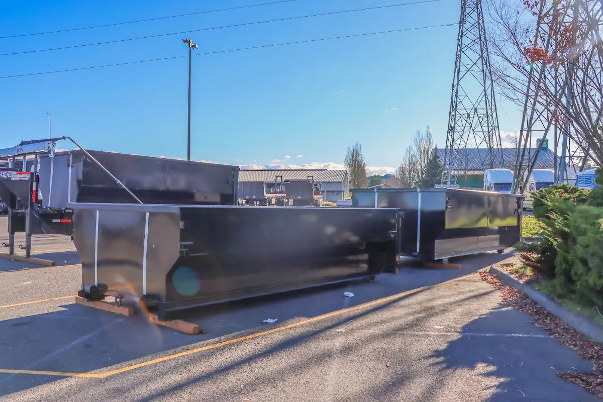 Roll-off dumpster ready for waste disposal at job site for 4 Yard Dumpster Rental in Topsham